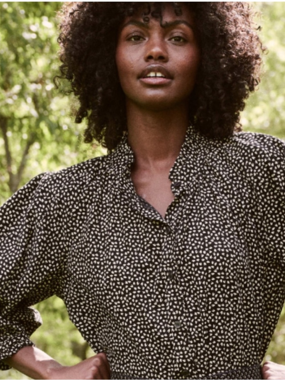 THE GREAT. The Boutonnière Top in Black